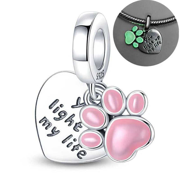 Glow In The Dark Pet Paw Dangle Charm - Pink paw print charm on a silver heart inscribed with "You light up my life.