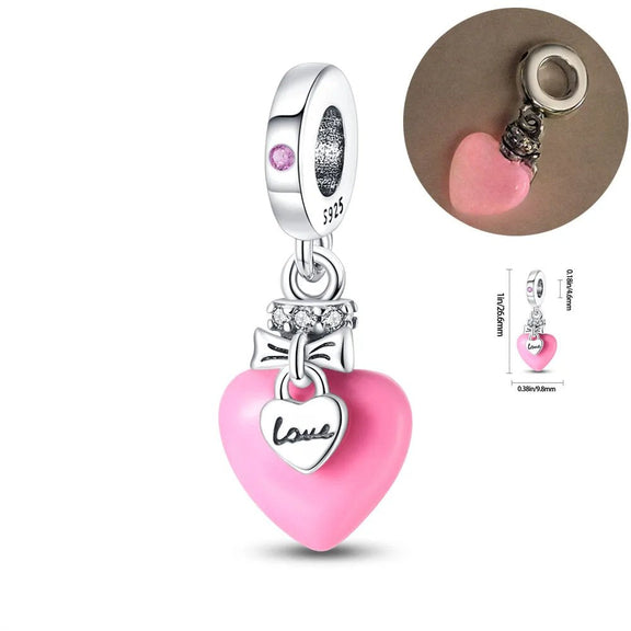 Pink Heart Love Charm - Pink heart charm with a smaller silver heart inscribed with "Love," made from 925 sterling silver.