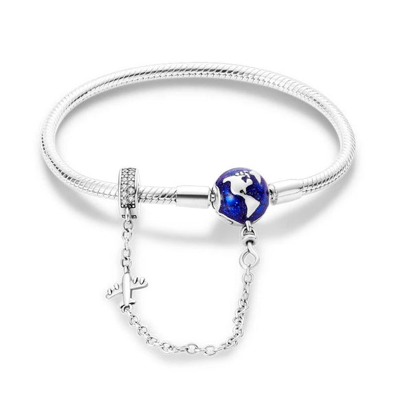 World Traveler Sterling Silver Bracelet with Globe and Airplane Charm - Sterling silver bracelet with a globe charm and airplane pendant, perfect for travel enthusiasts.