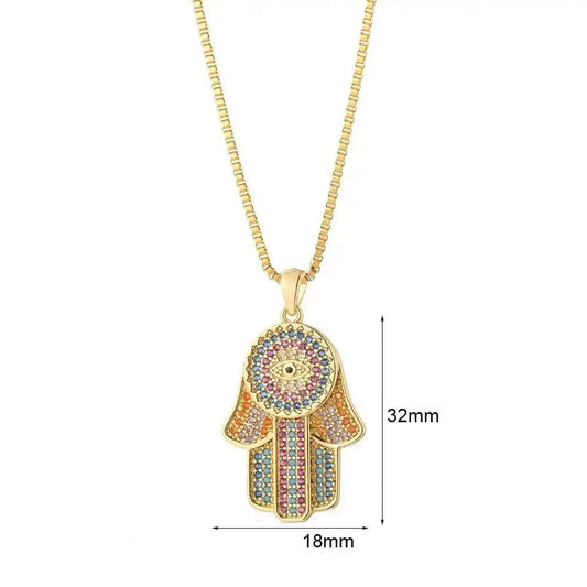 Gold-plated Hamsa hand pendant necklace adorned with multicolor crystals.