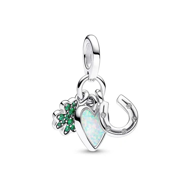 Sterling silver charm feat band a heart, clover, and horseshoe with opal, cubic zirconia,.