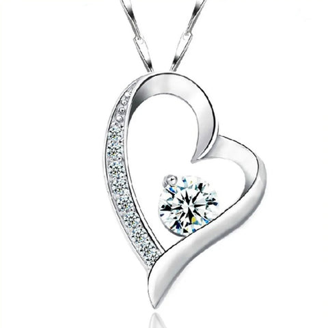 Heart-Shaped Crystal Pendant Necklace with Sterling Silver Chain - Heart-shaped crystal pendant necklace with sterling silver chain.