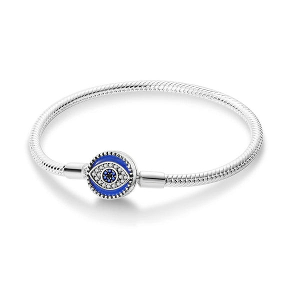 Evil Eye Sterling Silver Snake Chain Charm Bracelet - Evil eye sterling silver snake chain charm bracelet with blue and white cubic zirconia clasp