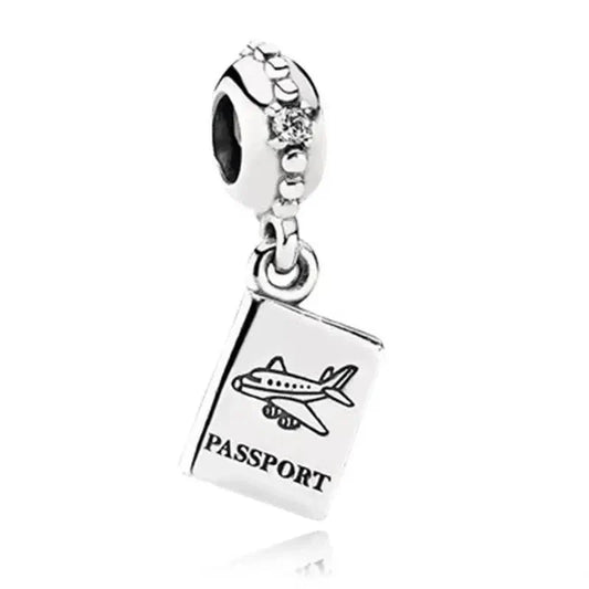 Silver With An Airplane And Passport Charm