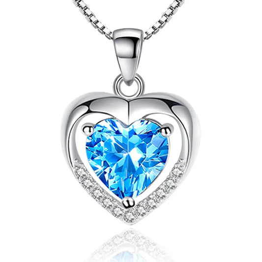Stunning blue heart pendant necklace with a vibrant blue gemstone.