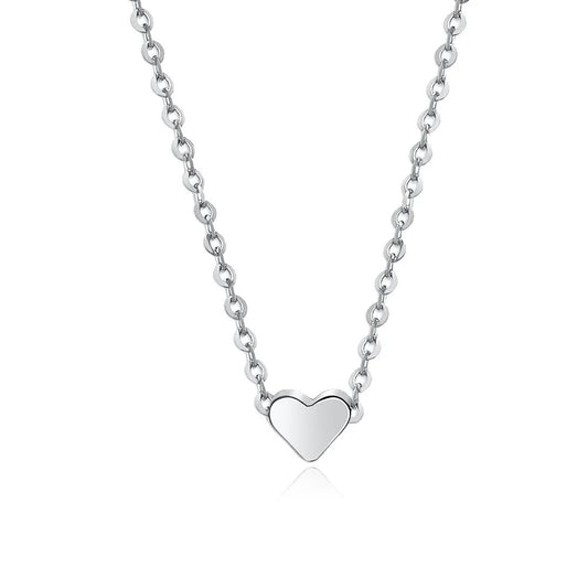 Delicate sterling silver necklace with a heart-shaped pendant.