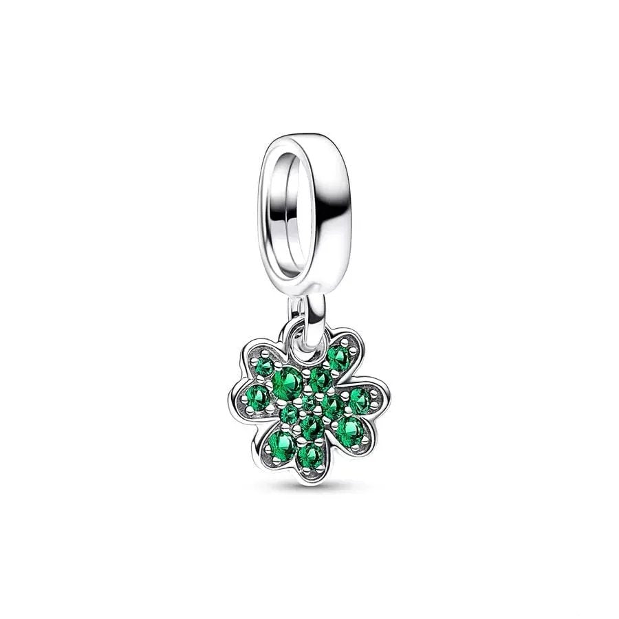 Silver lucky four-leaf clover charm adorned with green cubic zirconia.