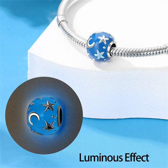 Starry Night Charm - Blue charm with raised silver stars and crescent moons for a celestial theme.