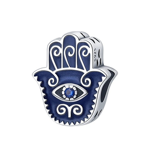 Sterling silver Hamsa hand charm with blue enamel and evil eye design.