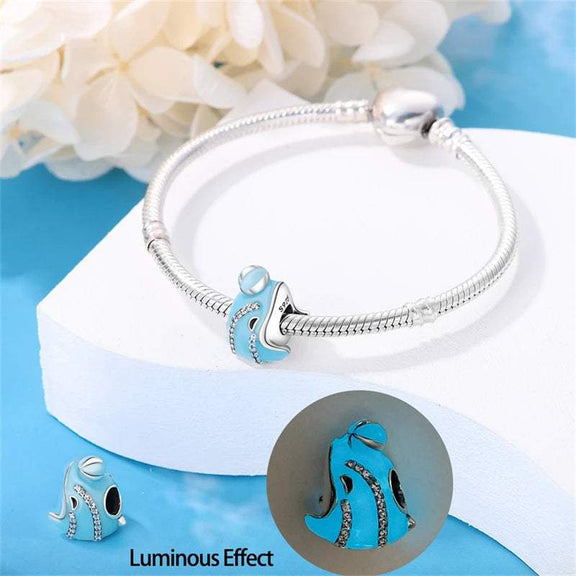 Sterling Silver Luminous Fish Charm for Pandora Bracelets - Sterling silver luminous fish charm on a bracelet, showing its luminous effect.