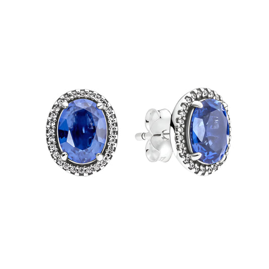 Sterling silver oval blue CZ stud earrings.