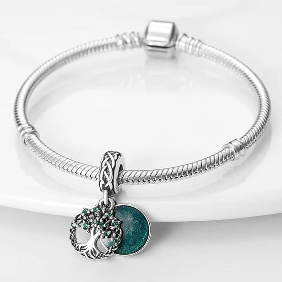 Sterling Silver Tree of Life Charm with Green Disc for Pandora Bracelets - Beautiful sterling silver tree of life charm with green cubic zirconia and a green disc background, perfect for Pandora bracelets.