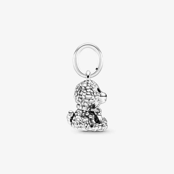 Cute Puppy Charm for Pandora Bracelets - A side profile of a sterling silver poodle charm, highlighting the charming details of the dog’s face and curly fur, with a hanging loop.