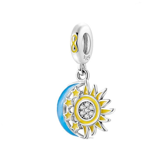 Sun, Moon, and Stars Charm with Enamel and Crystals in Sterling Silver - Sterling silver charm featuband a sun, moon, and stars with yellow and blue enamel.