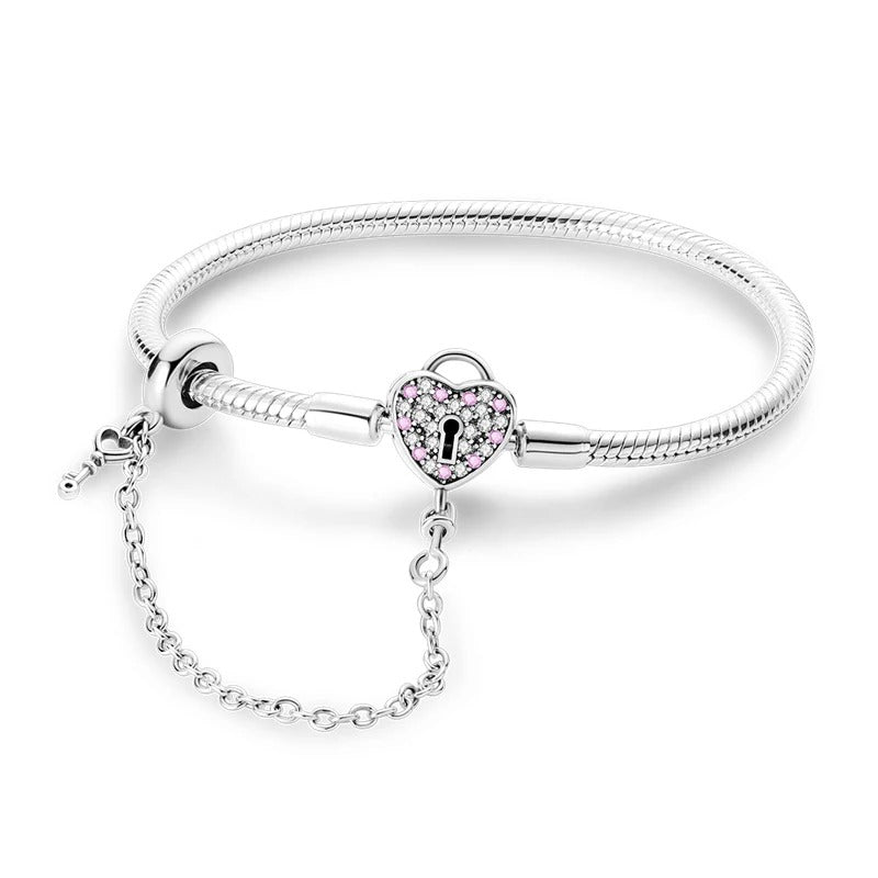 Pink heart lock sterling silver snake chain charm bracelet with cubic zirconia and key charm