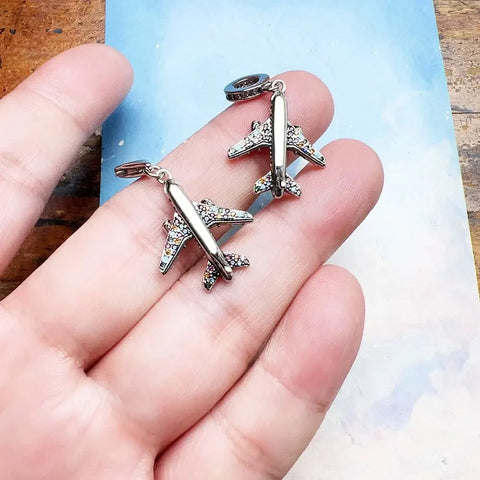 Airplane charm jewelry.