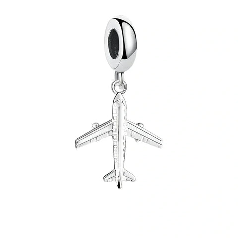 Silver airplane charm.