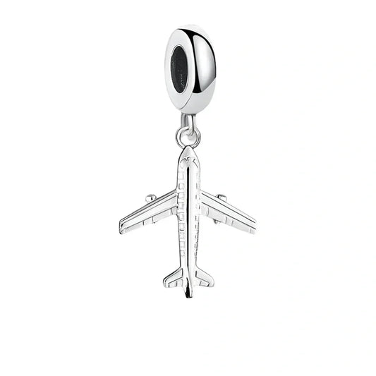 Silver airplane charm.