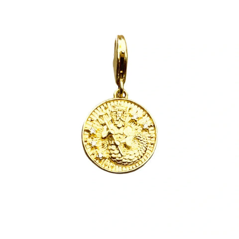 Gold coin pendant with a mythological figure.