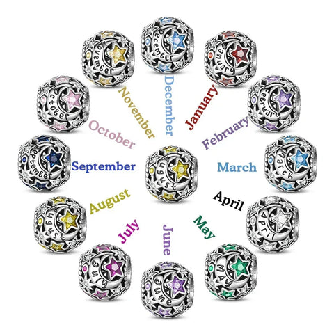 Silver charm beads representing months of the year.