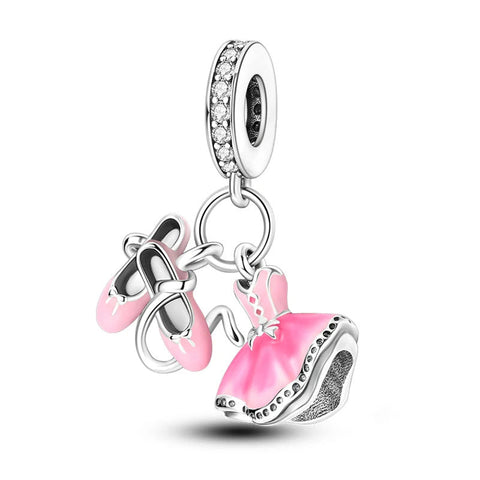 Ballerina shoes and dress charm with pink accents.