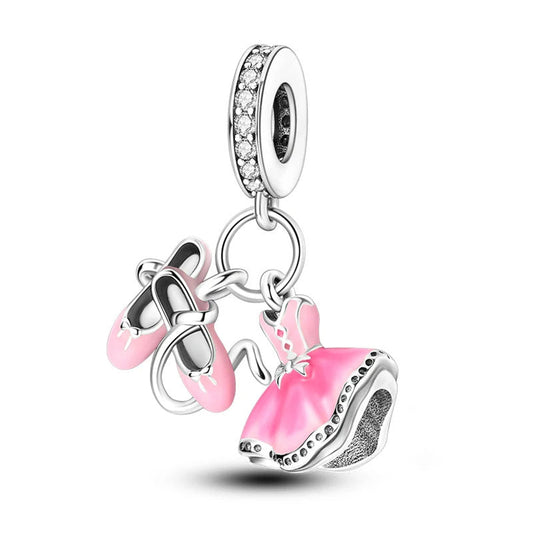 Ballerina shoes and dress charm with pink accents.