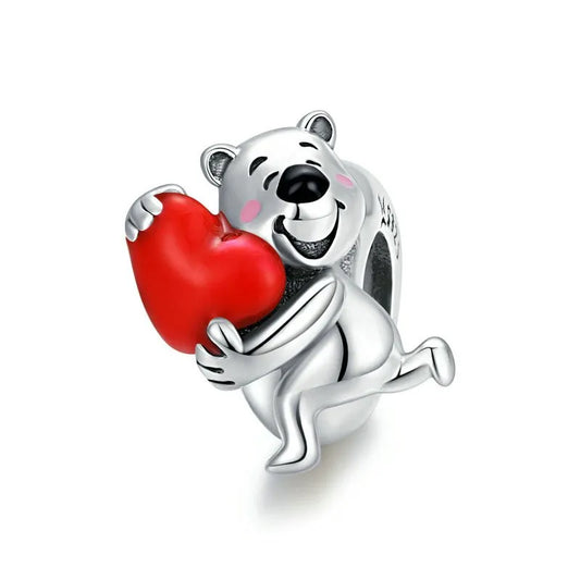 bear holding red heart charm