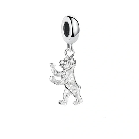 Silver bear charm.