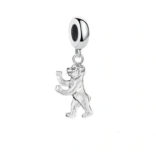 Silver bear charm.