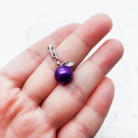 Purple pearl apple charm.