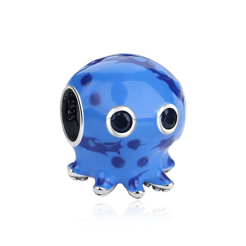 A blue enamel octopus charm with dark navy spots and black crystal eyes set in a silver-tone setting, designed to clip onto charm bracelets