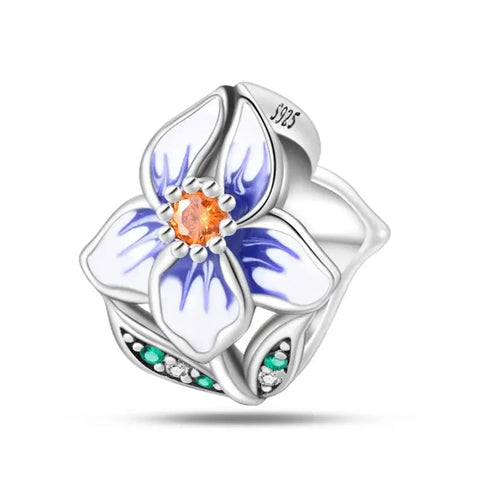 Orchid Flower Charm with Orange Crystal Center and Green Accents