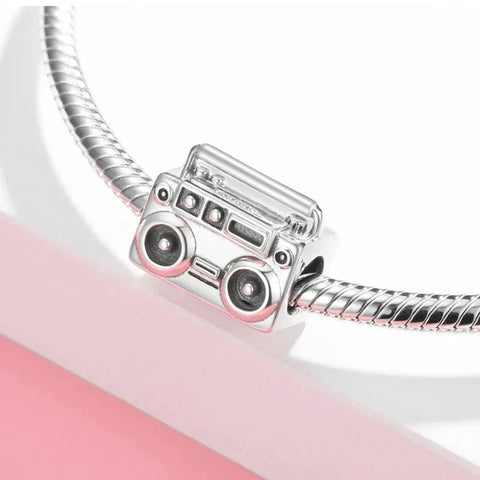 Silver boombox charm.