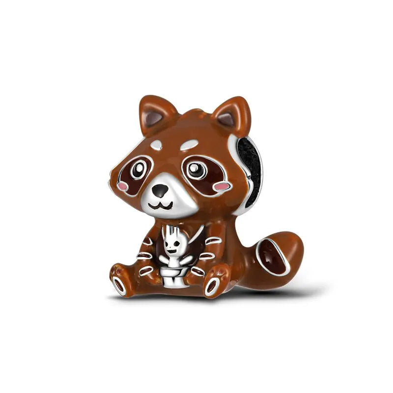 brown raccoon charm with enamel