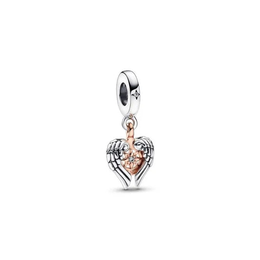 Angel wings and compass charm in Pandora Rose, a celestial addition symbolizing guidance