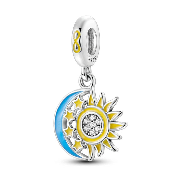 Sterling Silver Sun and Moon Dangle Charm - Sterling silver sun and moon dangle charm with enamel and cubic zirconia accents.