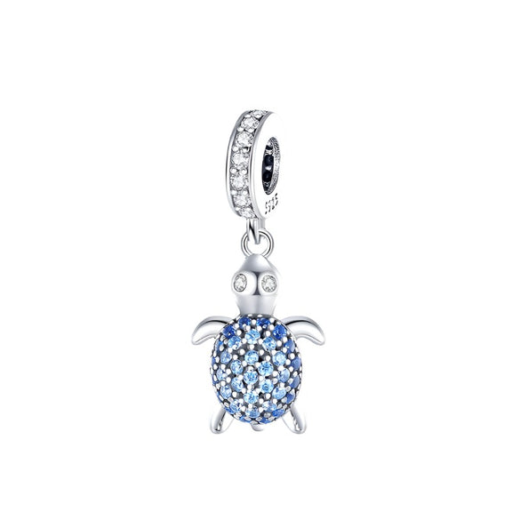 Sterling Silver Turtle Charm with Blue Crystals - Sterling silver turtle charm with blue crystals and cubic zirconia accents.