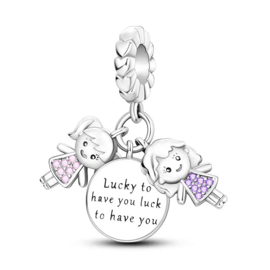 Sterling silver "Lucky to Have You" charm with enamel and crystals.