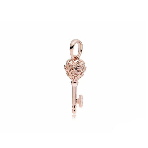 Heart Key Charm Unlock Love for Pandora Bracelets - Heart Key charm in rose gold with intricate details, fits Pandora bracelets