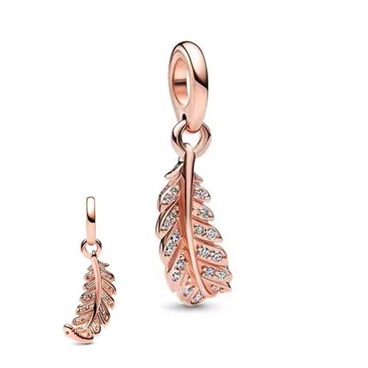Feather charm in rose gold with sparkling accents, fits Pandora bracelets