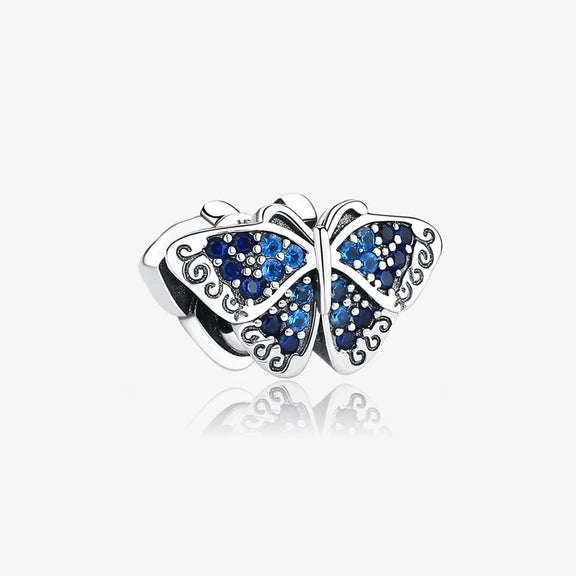 Sterling Silver Filigree Butterfly Charm with Blue Crystals - Sterling silver filigree butterfly charm with blue crystals