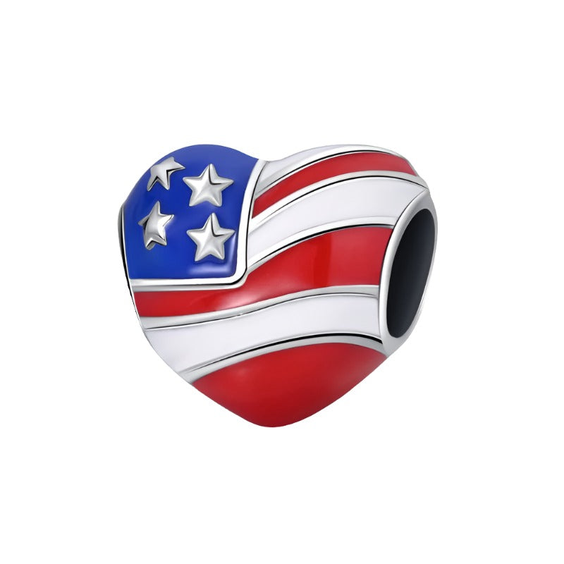 American heart charm with red, white, and blue enamel, adorned with stars.