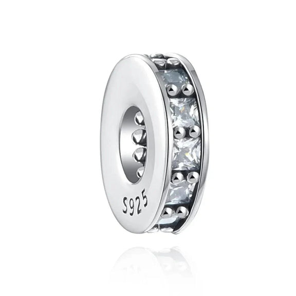 Clear Cubic Zirconia Spacer Charm in Sterling Silver - Sterling silver spacer charm with a row of clear cubic zirconia stones for added sparkle and balance.