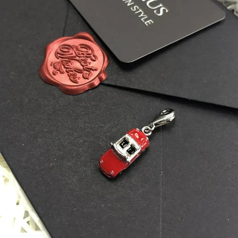 Red car charm.