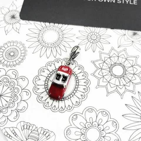 Red car charm.
