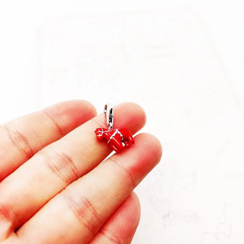 Red Dala horse charm.
