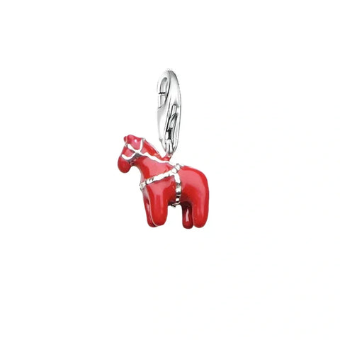 Red horse charm with silver accents.