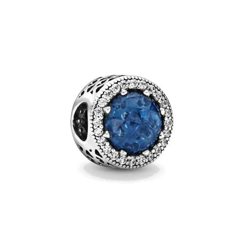 Sterling Silver Charm with Deep Blue Gemstone and Crystal Halo - Sterling silver charm with a deep blue gemstone surrounded by a halo of sparkling crystals for an elegant look.
