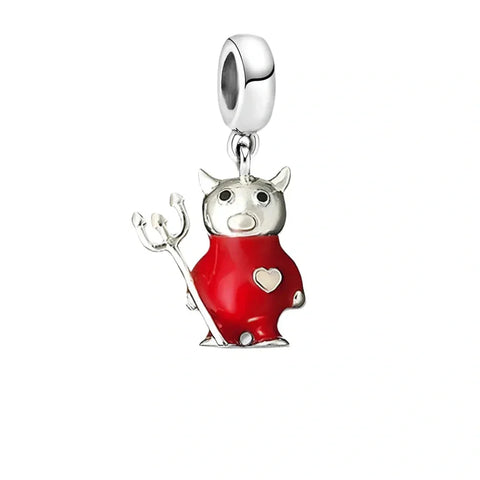 Silver and red devil charm.