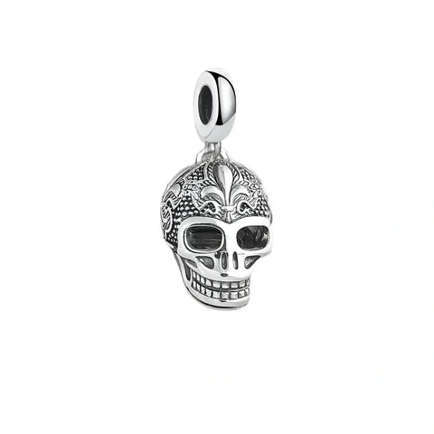 Silver skull charm.